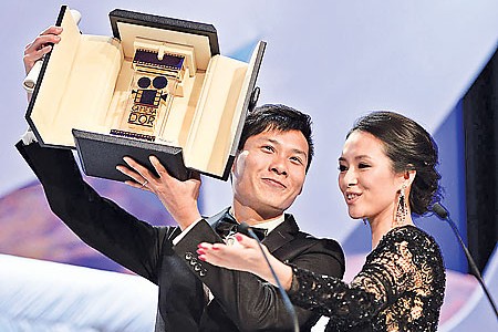 Anthony Chen Ilo Ilo Cannes Camera d'Or film festival winner Zhang Ziyi