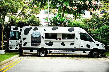 Hip food truck travelling C.O.W cow food scene